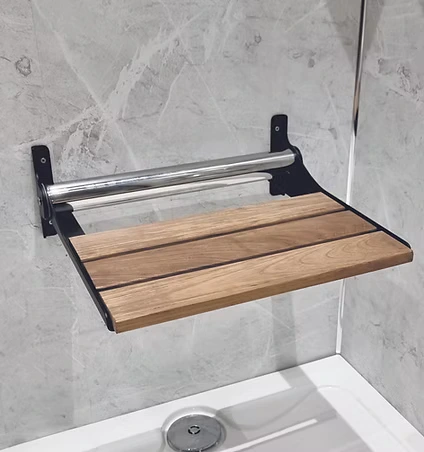 Shower seat with guard rail